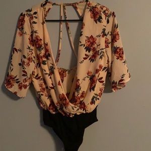 Floral body suit shirt.